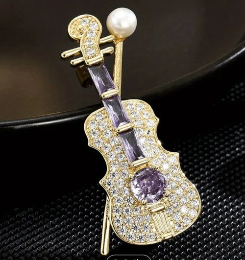 Spilla violino oro con pietre lilla 4,2x1,9 cm