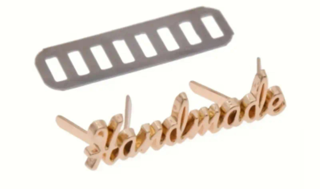 Etichetta metallica handmade 3,1x1,00 cm